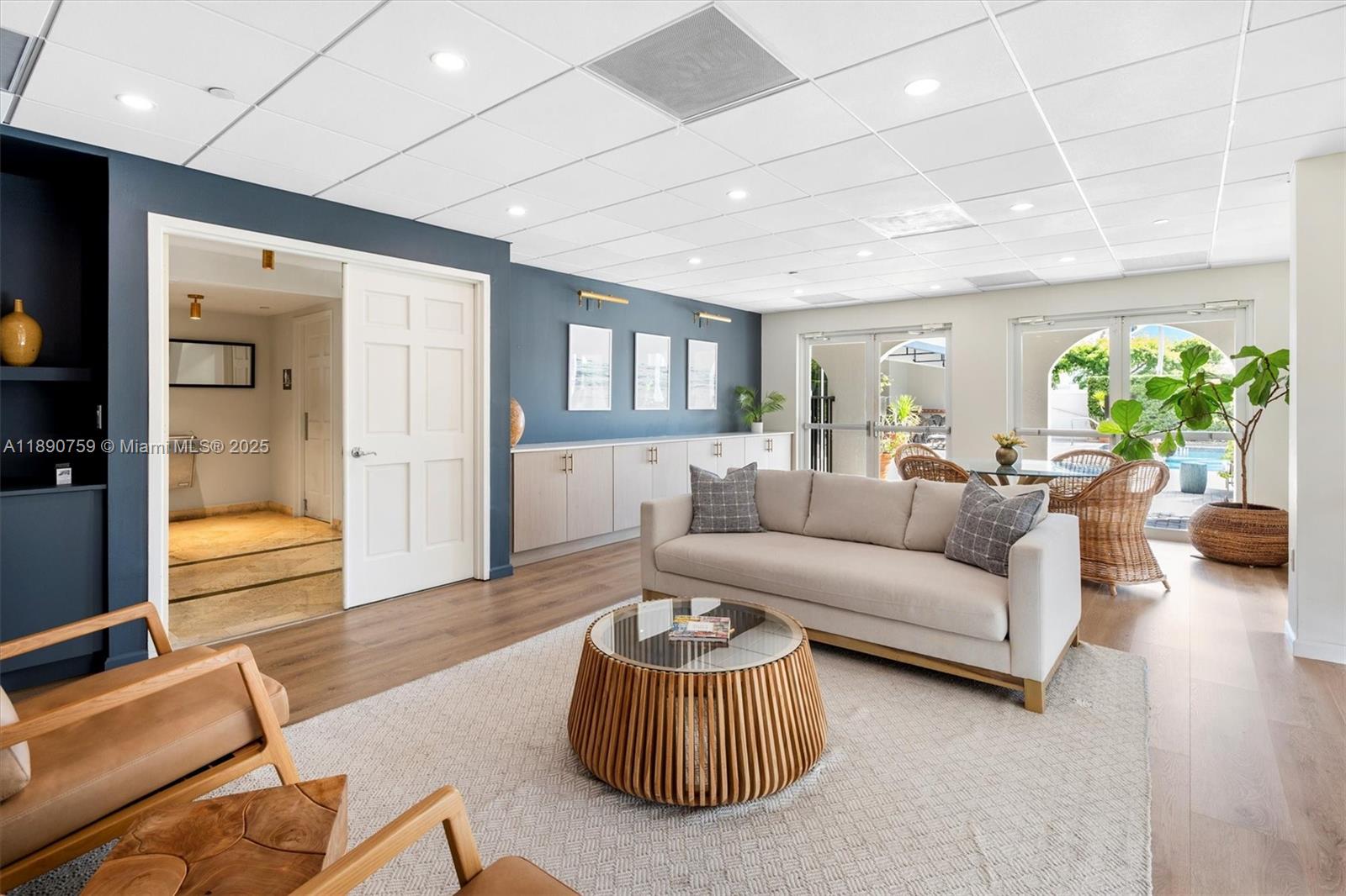 2351 Douglas Road, Unit 906 Miami, FL 33145 - Photo 40 of 45 a living room with furniture and a large window