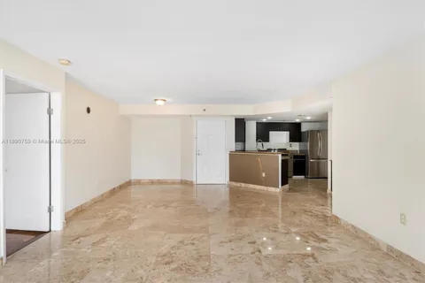 a view of a kitchen with a sink
