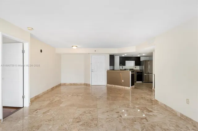 a view of a kitchen with a sink