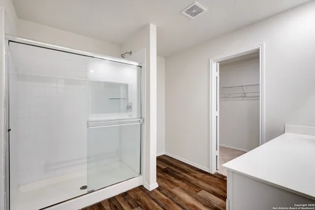 a view of a room with racks on the wall