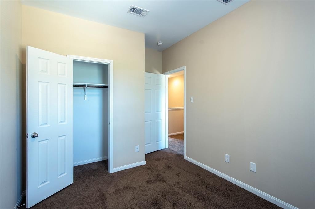 8142 Cabot Street, Unit A Houston, TX 77078 - Photo 8 of 21 an empty room with closet area