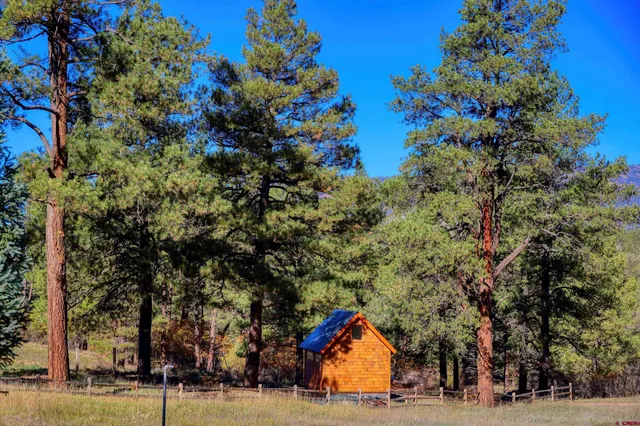 a view of swimming pool with an outdoor space and seating area