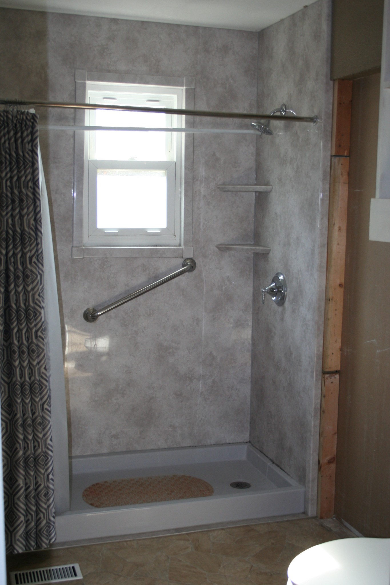 750 Belmont Church Road Whitwell, TN 37397 - Photo 13 of 15 a bathroom with a glass shower door