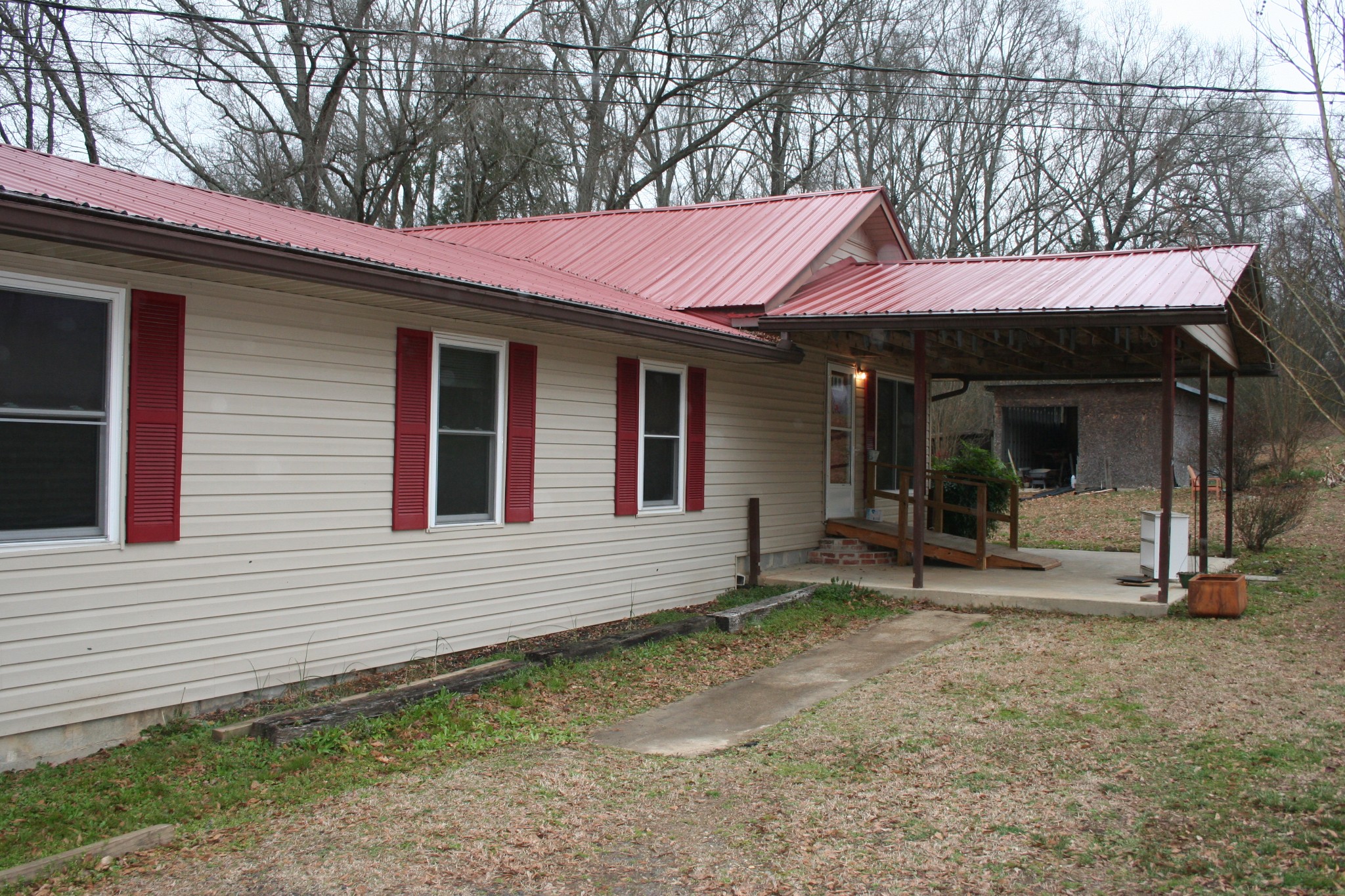 750 Belmont Church Road Whitwell, TN 37397 - Photo 4 of 15 a view of a house with a yard and large tree