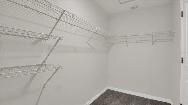 a view of a room with racks on the wall