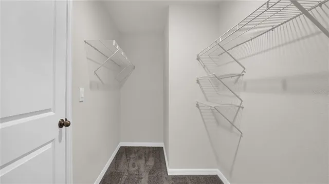 a view of small space with racks on the wall