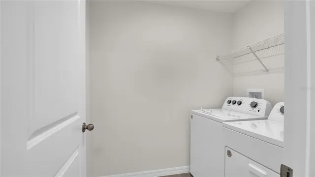 a view of utility room with washer and dryer
