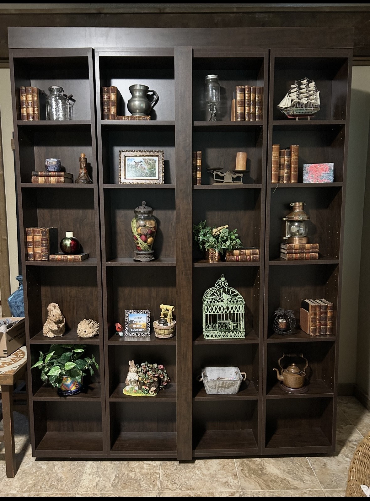 141 Walnut Loop Shepherd, TX 77371 - Photo 14 of 50 This is not just a beautiful bookcase- this is a Murphy bed that stays with the property! This is an incredible piece and it’s easy to use!