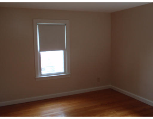 23 Drexel Street Springfield, MA 01104 - Photo 4 of 9 an empty room with a window