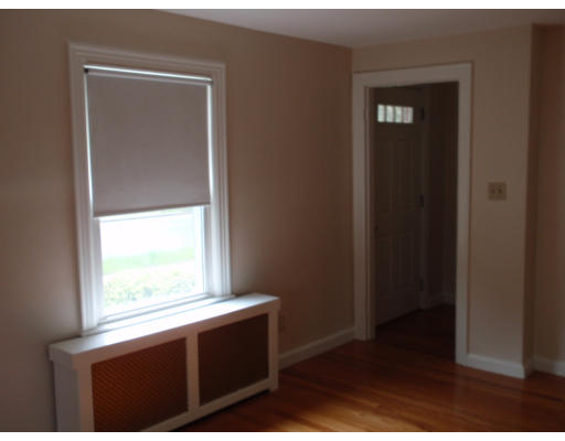 23 Drexel Street Springfield, MA 01104 - Photo 5 of 9 a view of an empty room and window