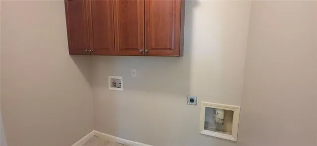 a view of door with washer and dryer