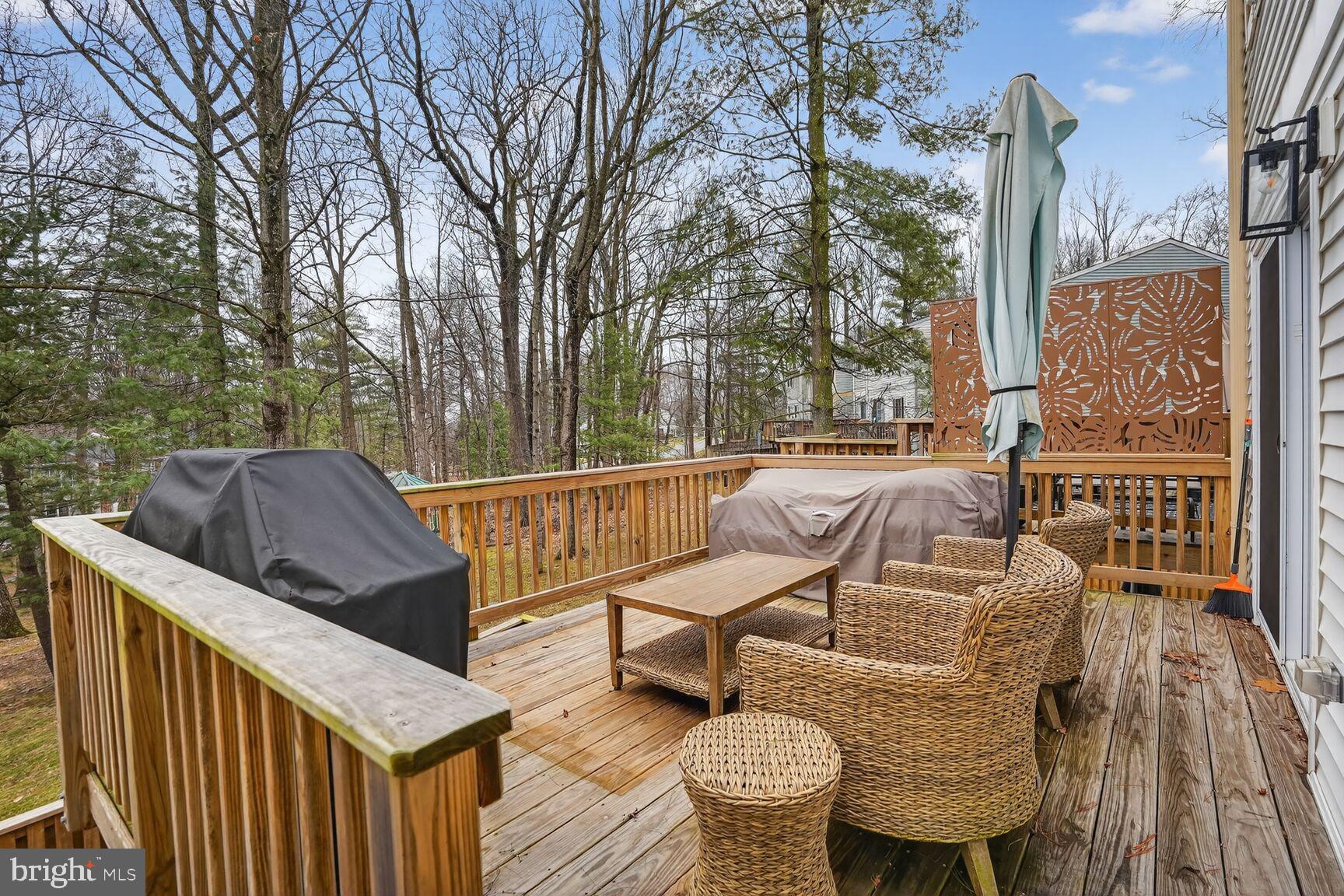 1575 Bennington Woods Court Reston, VA 20194 - Photo 14 of 39 a view of balcony with wooden floor and outdoor seating