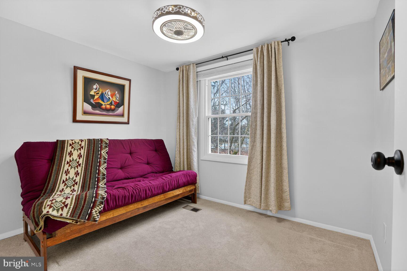 1575 Bennington Woods Court Reston, VA 20194 - Photo 23 of 39 a living room with furniture and a window