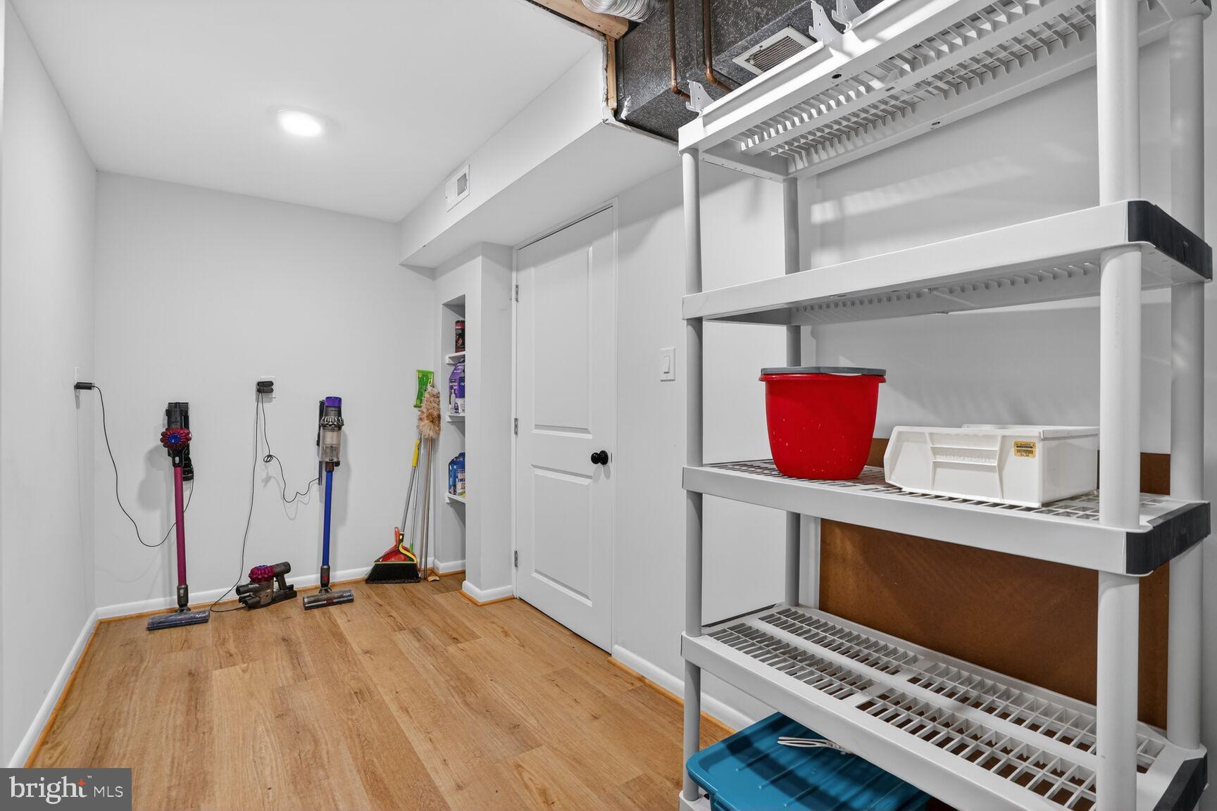 1575 Bennington Woods Court Reston, VA 20194 - Photo 30 of 39 a bed room with a bed and a television