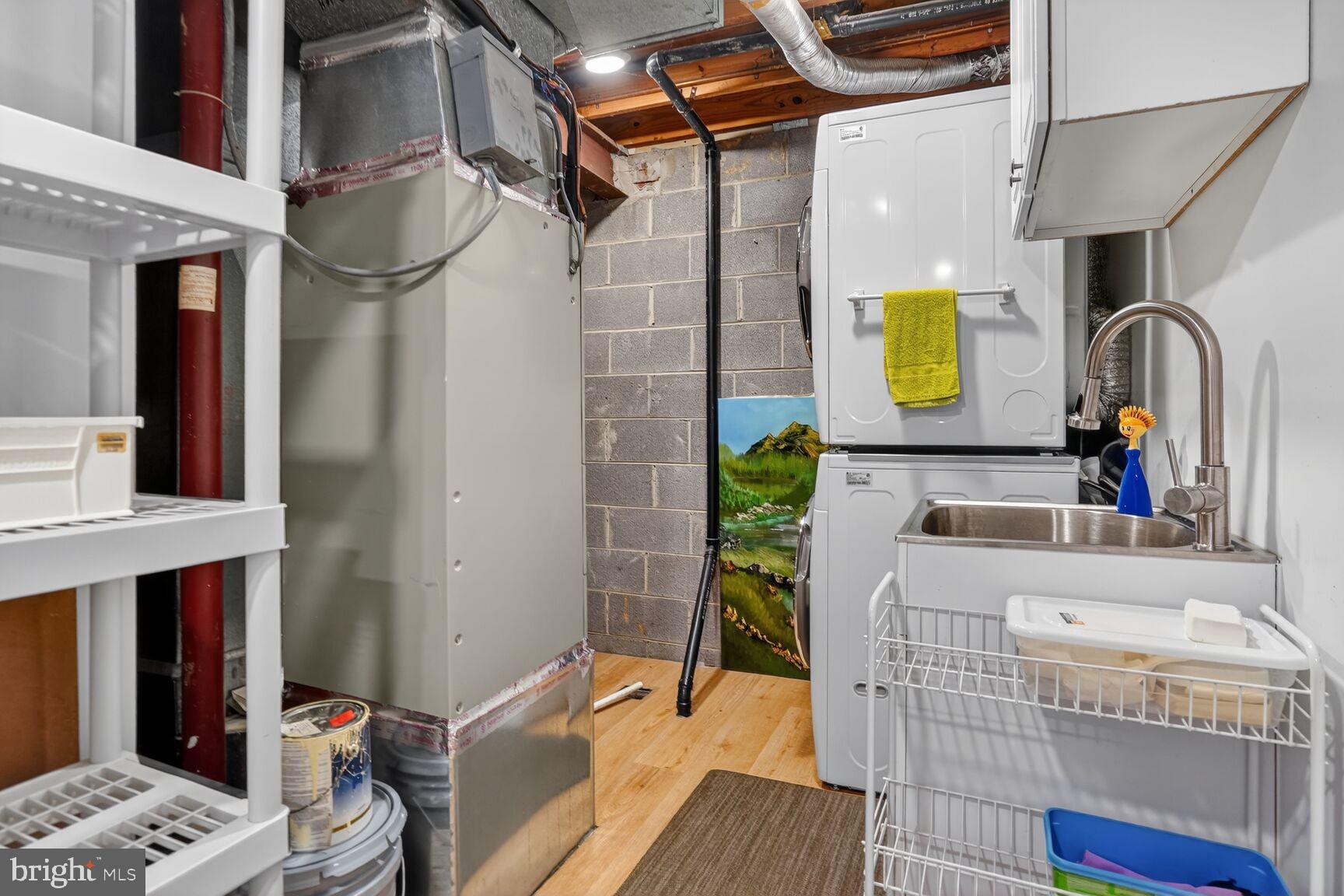 1575 Bennington Woods Court Reston, VA 20194 - Photo 31 of 39 a bathroom with a sink a mirror and shower