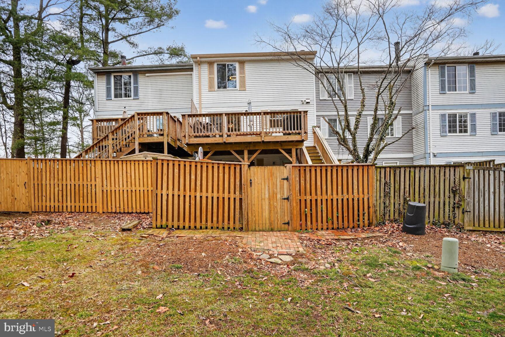 1575 Bennington Woods Court Reston, VA 20194 - Photo 34 of 39 a front view of a house with iron fence