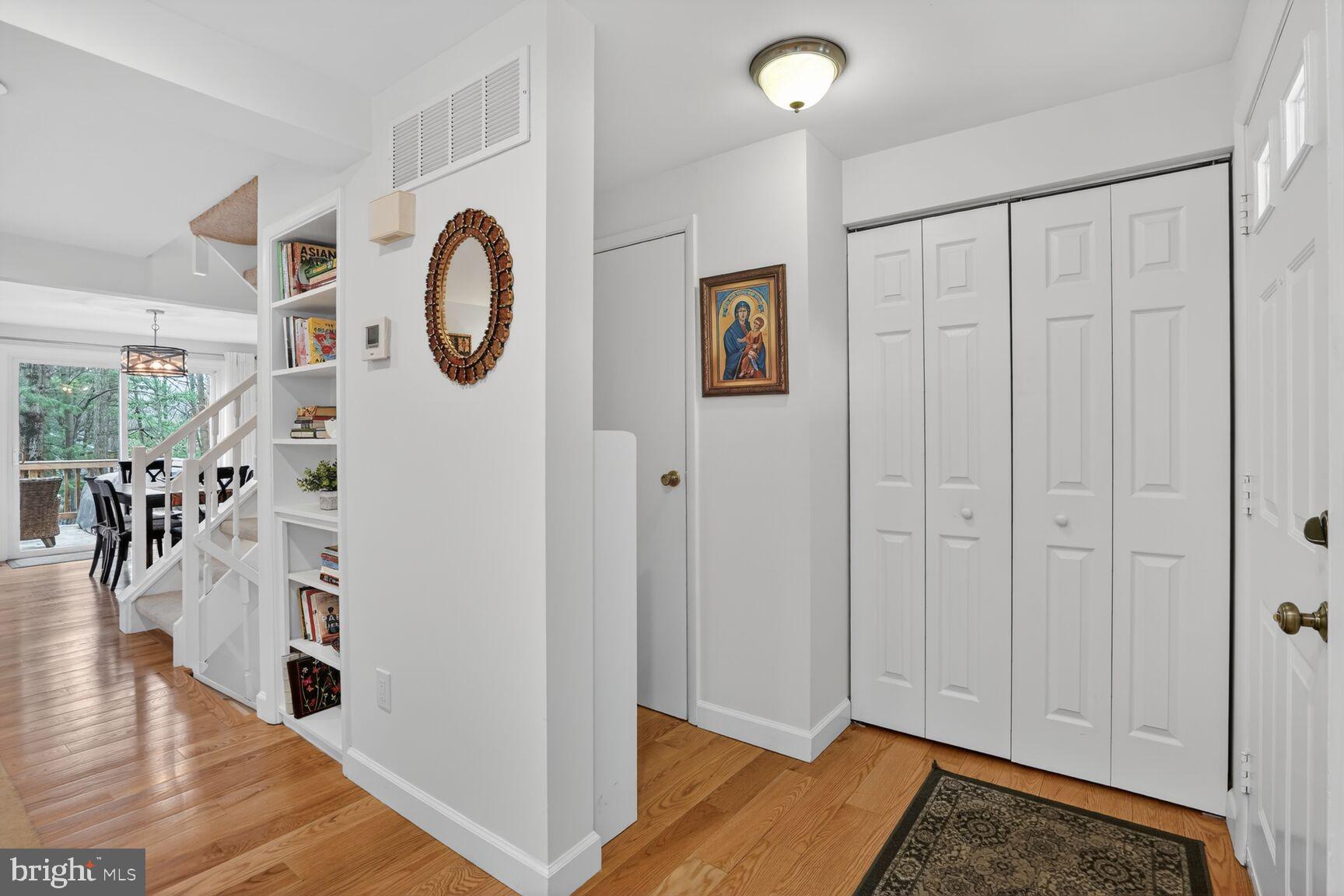 1575 Bennington Woods Court Reston, VA 20194 - Photo 4 of 39 a view of a livingroom with wooden floor and entryway