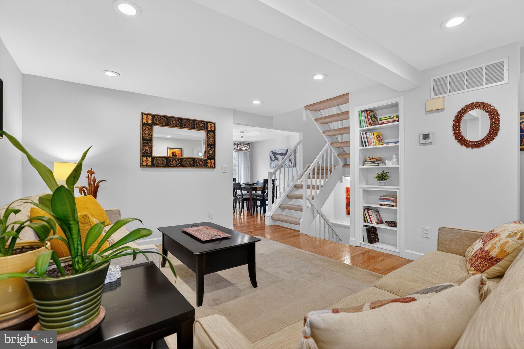 1575 Bennington Woods Court Reston, VA 20194 - Photo 7 of 39 a living room with furniture and wooden floor