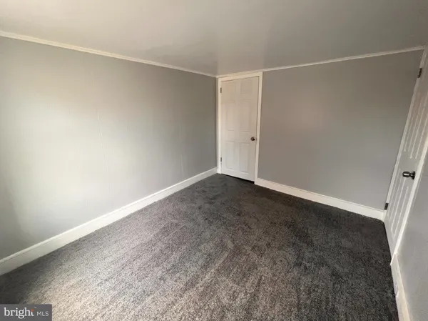 an empty room with a workbench