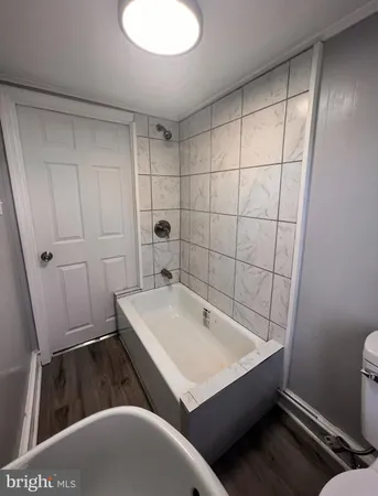 a bathroom with a sink and a bathtub