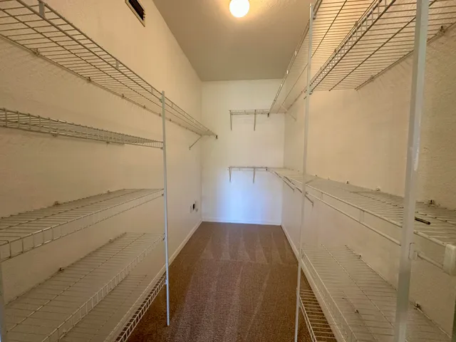 a view of a walk in closet