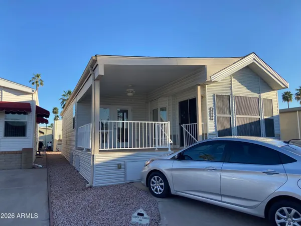 a view of a car in front of house
