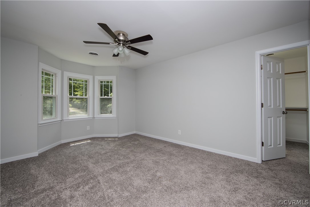 2160 Genito Road Moseley, VA 23120 - Photo 15 of 49 a view of an empty room with a window