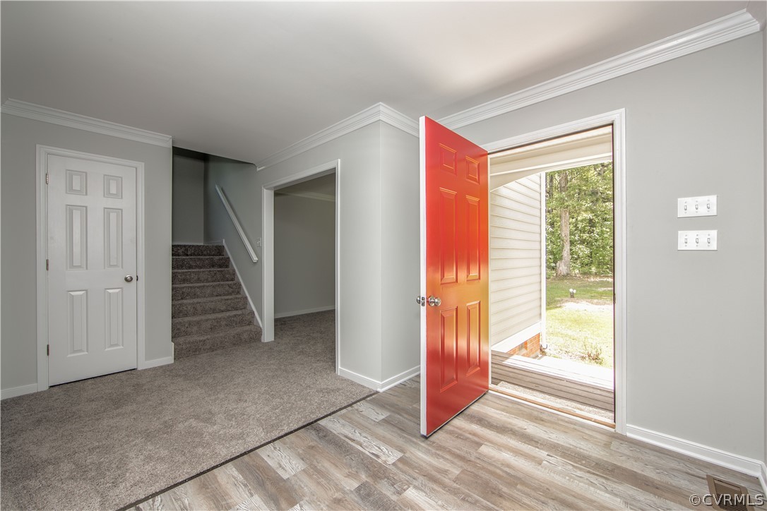 2160 Genito Road Moseley, VA 23120 - Photo 17 of 49 a view of a room with wooden floor and windows