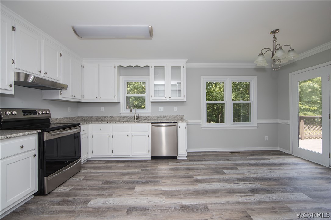 2160 Genito Road Moseley, VA 23120 - Photo 4 of 49 a kitchen with stainless steel appliances granite countertop a stove a sink and a granite counter tops