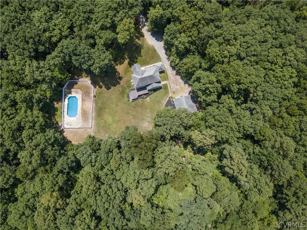 2160 Genito Road Moseley, VA 23120 - Photo 48 of 49 an aerial view of a house with a yard and trees