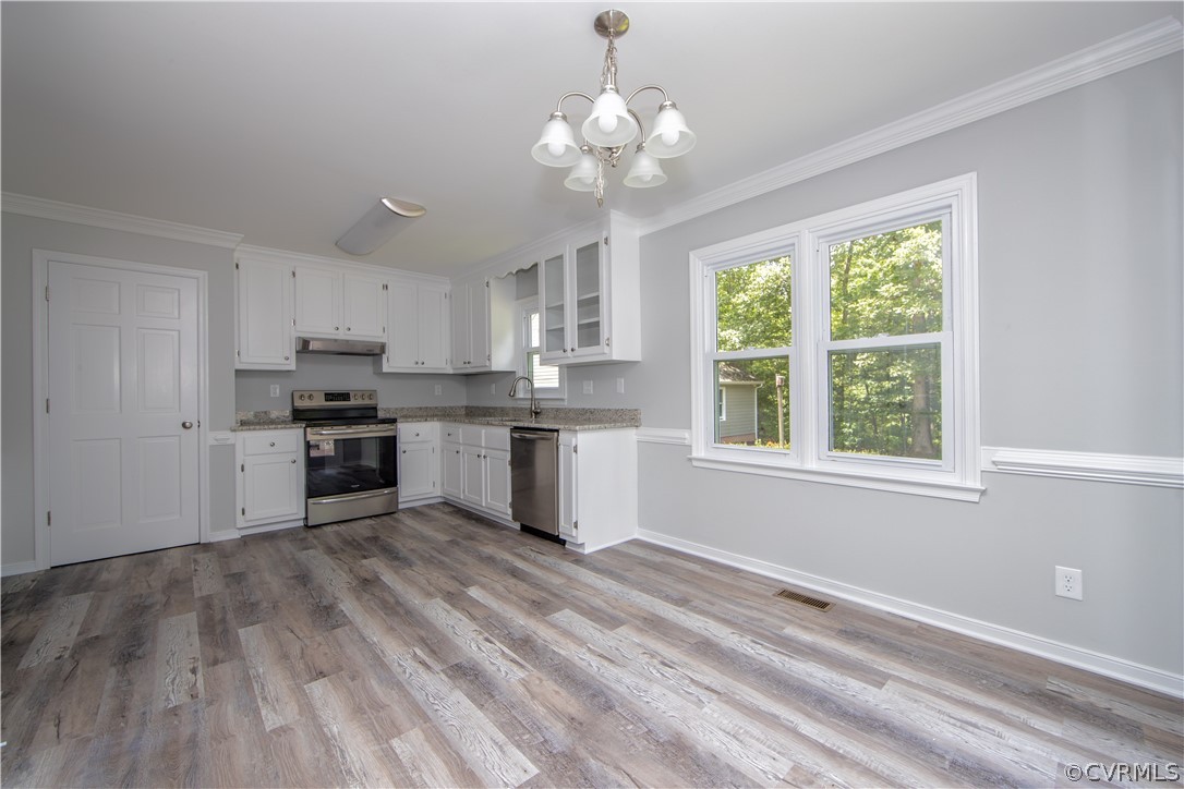 2160 Genito Road Moseley, VA 23120 - Photo 9 of 49 a kitchen with stainless steel appliances granite countertop a stove top oven a sink dishwasher with a cabinets and wooden floor