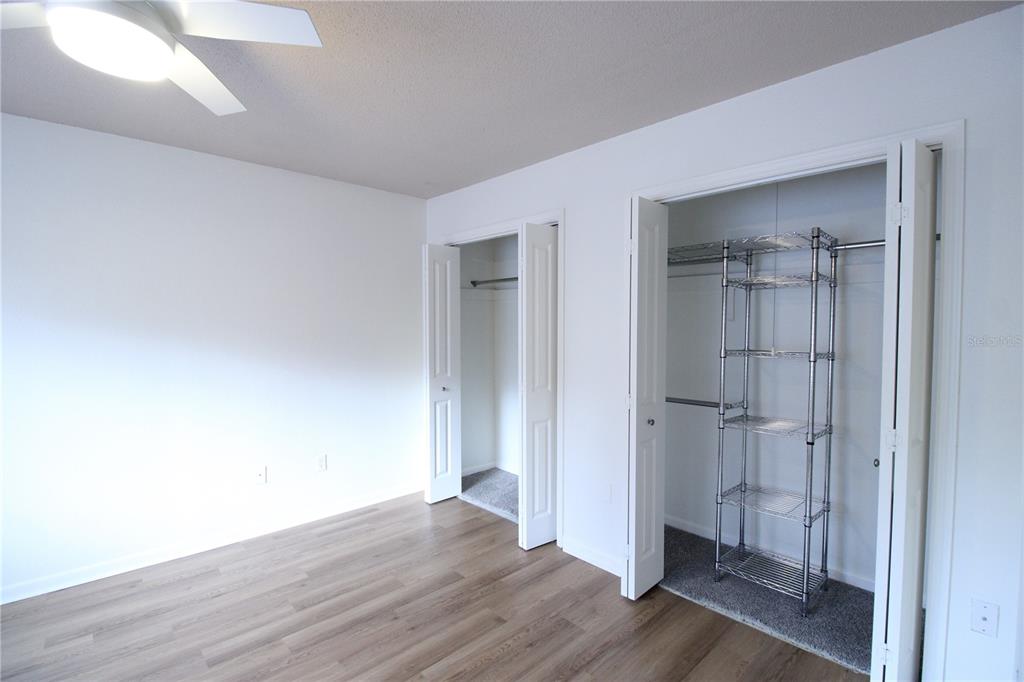507 Northwest 39th Road, Unit 112 Gainesville, FL 32607 - Photo 13 of 23 a view of empty room with wooden floor