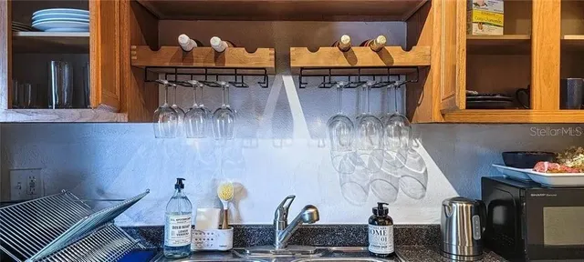 a room with lots of bottles of alcohol