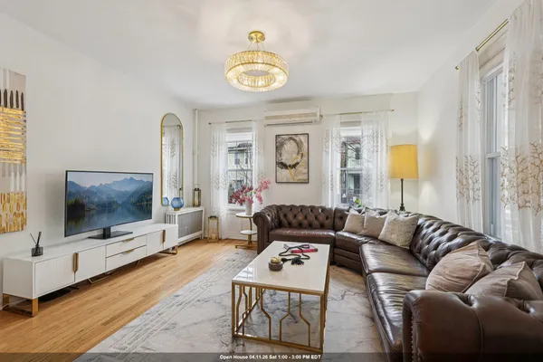 a living room with furniture and a couch