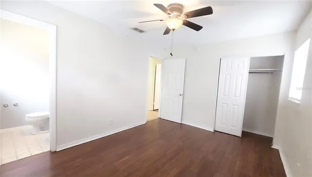 a view of an empty room and window