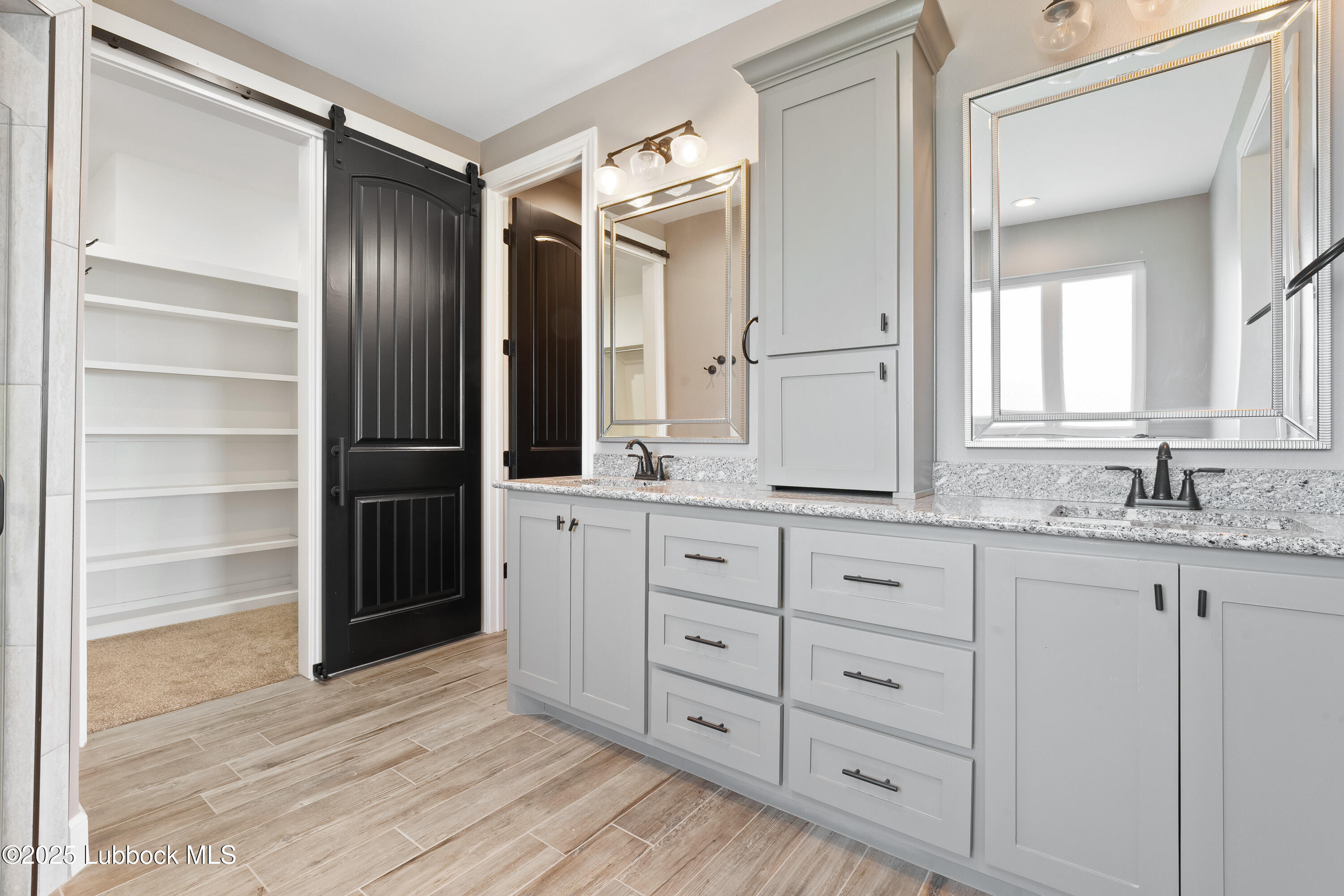 110 Ward Road Snyder, TX 79549 - Photo 15 of 37 a bathroom with a granite countertop sink mirror and