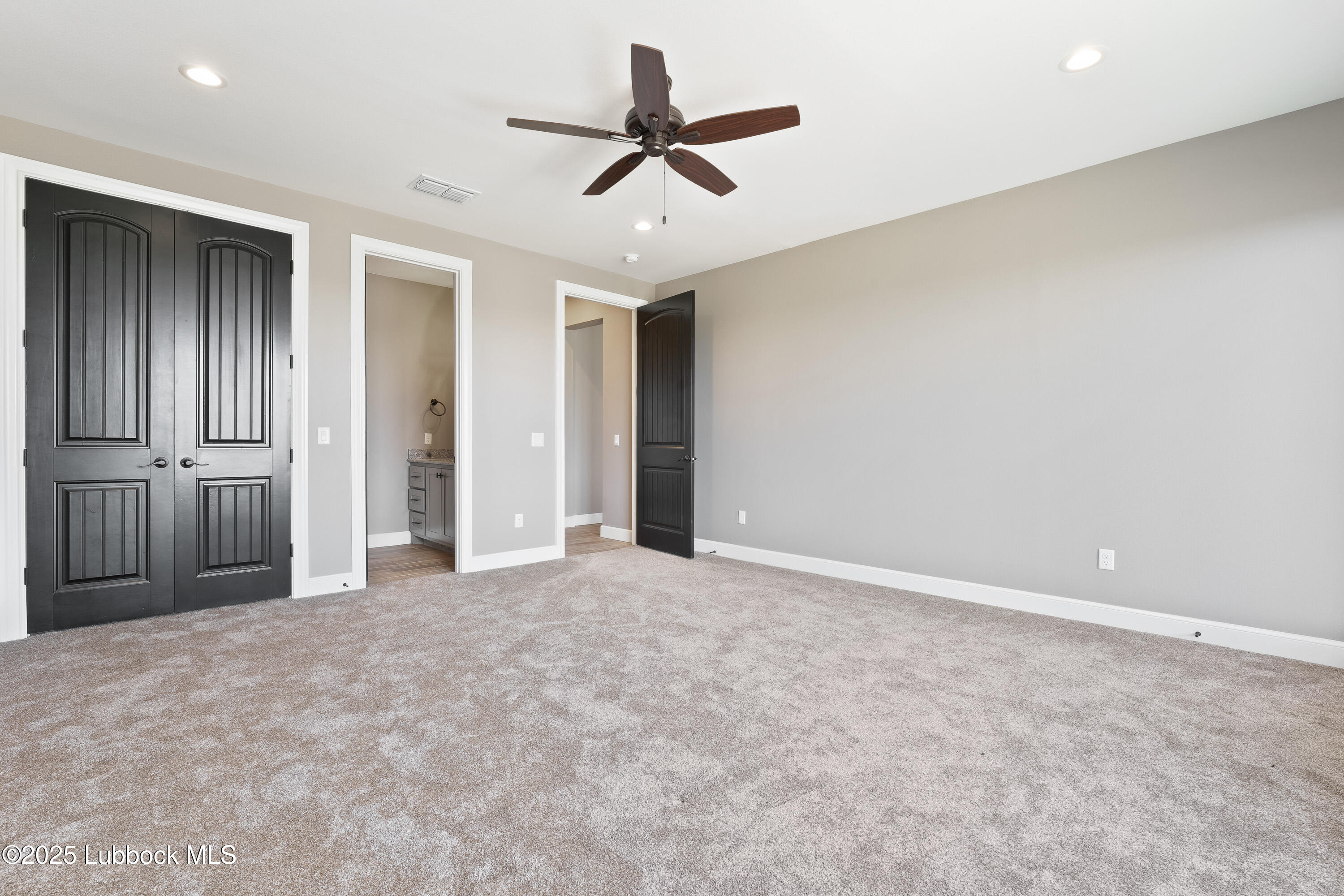 110 Ward Road Snyder, TX 79549 - Photo 20 of 37 an empty room with closet and ceiling fan