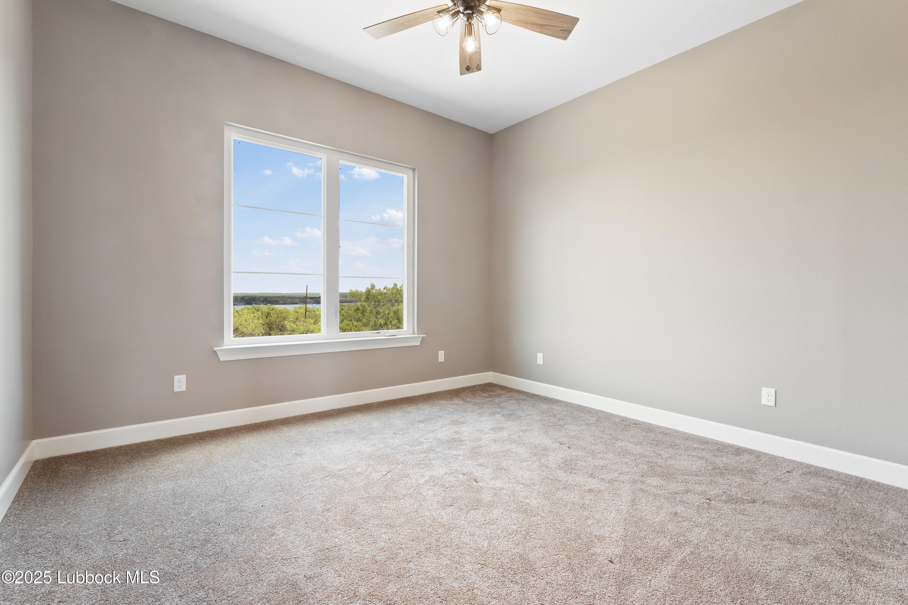 110 Ward Road Snyder, TX 79549 - Photo 24 of 37 an empty room with a window