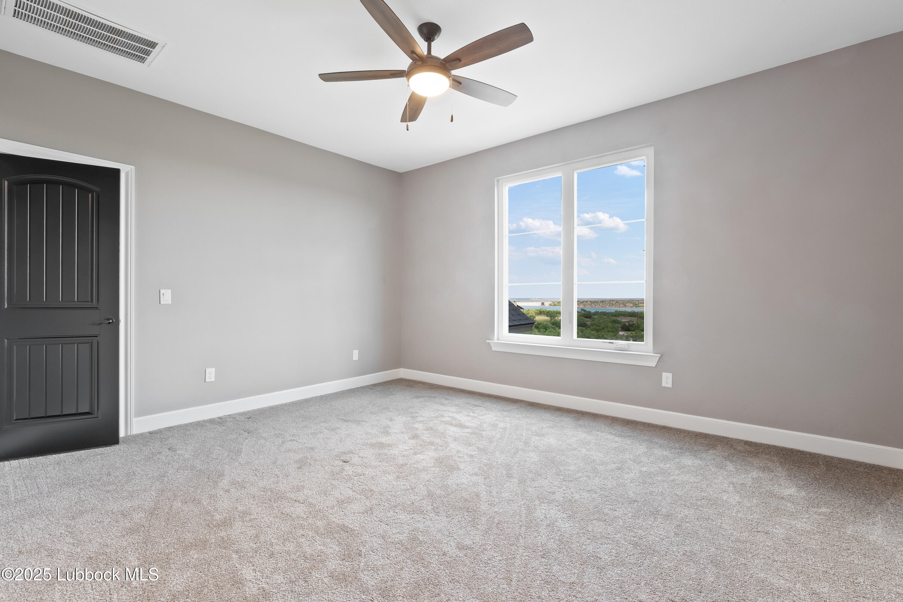 110 Ward Road Snyder, TX 79549 - Photo 28 of 37 a view of an empty room with a window