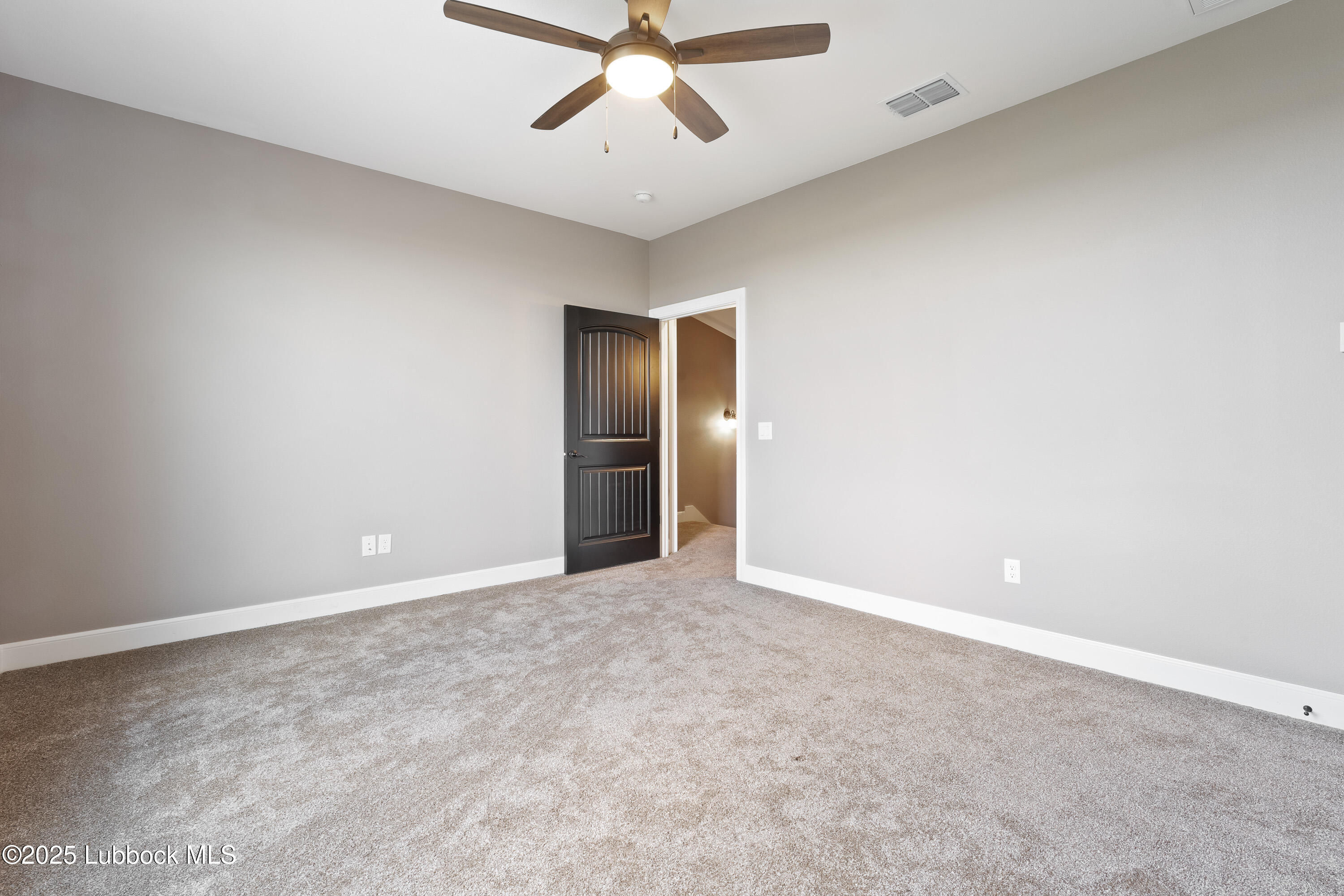 110 Ward Road Snyder, TX 79549 - Photo 29 of 37 an empty room with chandelier fan