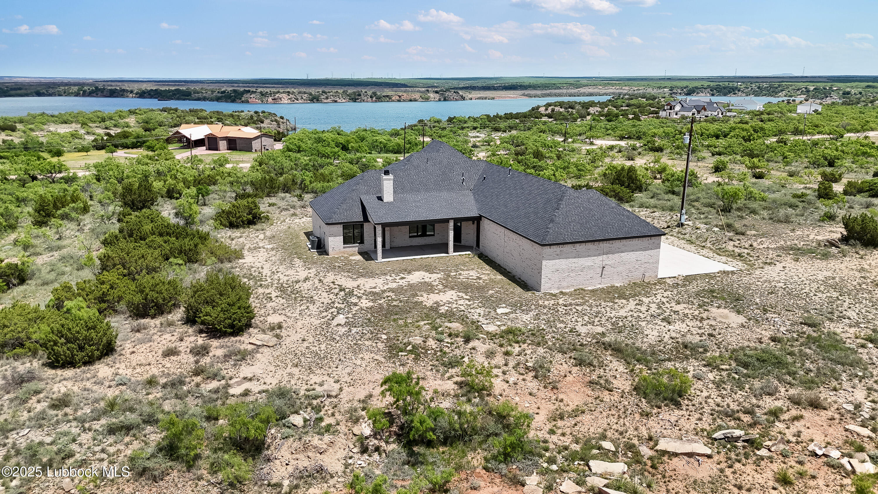 110 Ward Road Snyder, TX 79549 - Photo 35 of 37 an aerial view of a house with garden space and outdoor seating