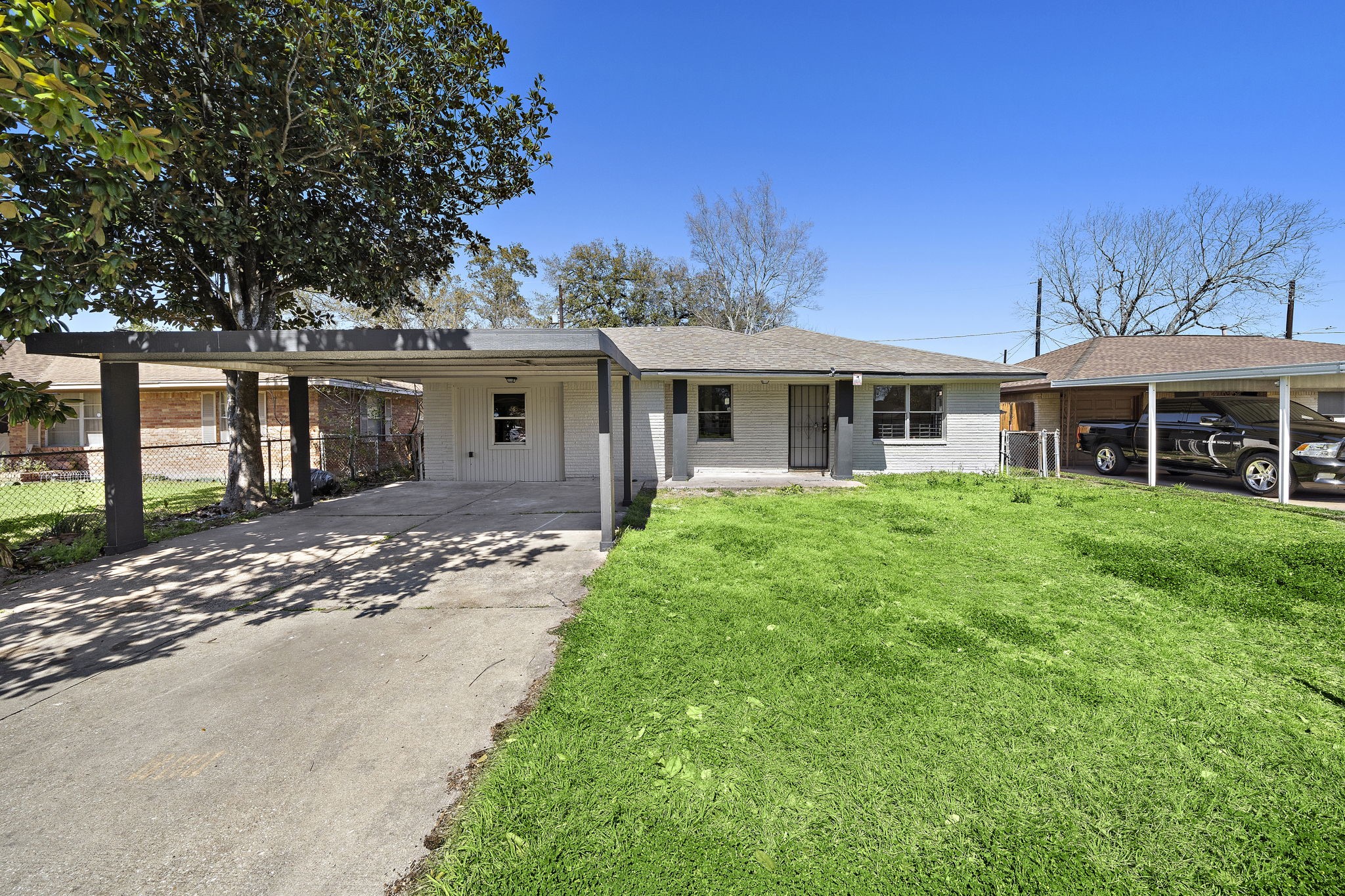 3121 Chimira Lane Houston, TX 77051 - Photo 1 of 35 a view of a house with a yard and potted plants