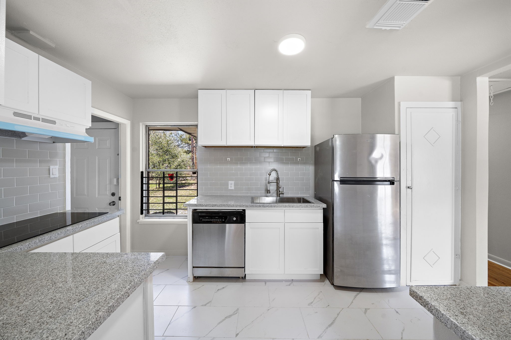 3121 Chimira Lane Houston, TX 77051 - Photo 17 of 35 a kitchen with a refrigerator sink and stove