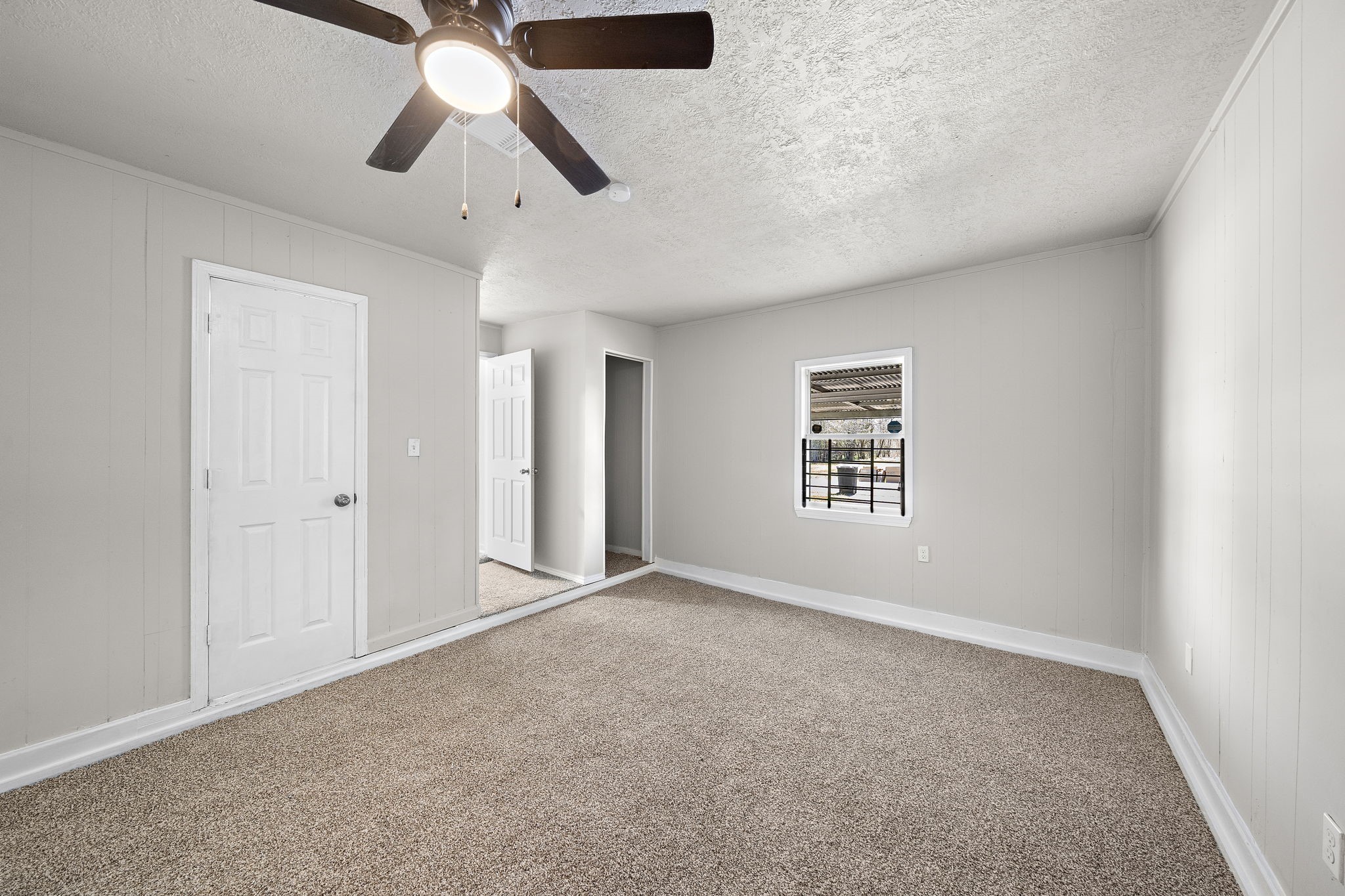 3121 Chimira Lane Houston, TX 77051 - Photo 20 of 35 an empty room with chandelier fan