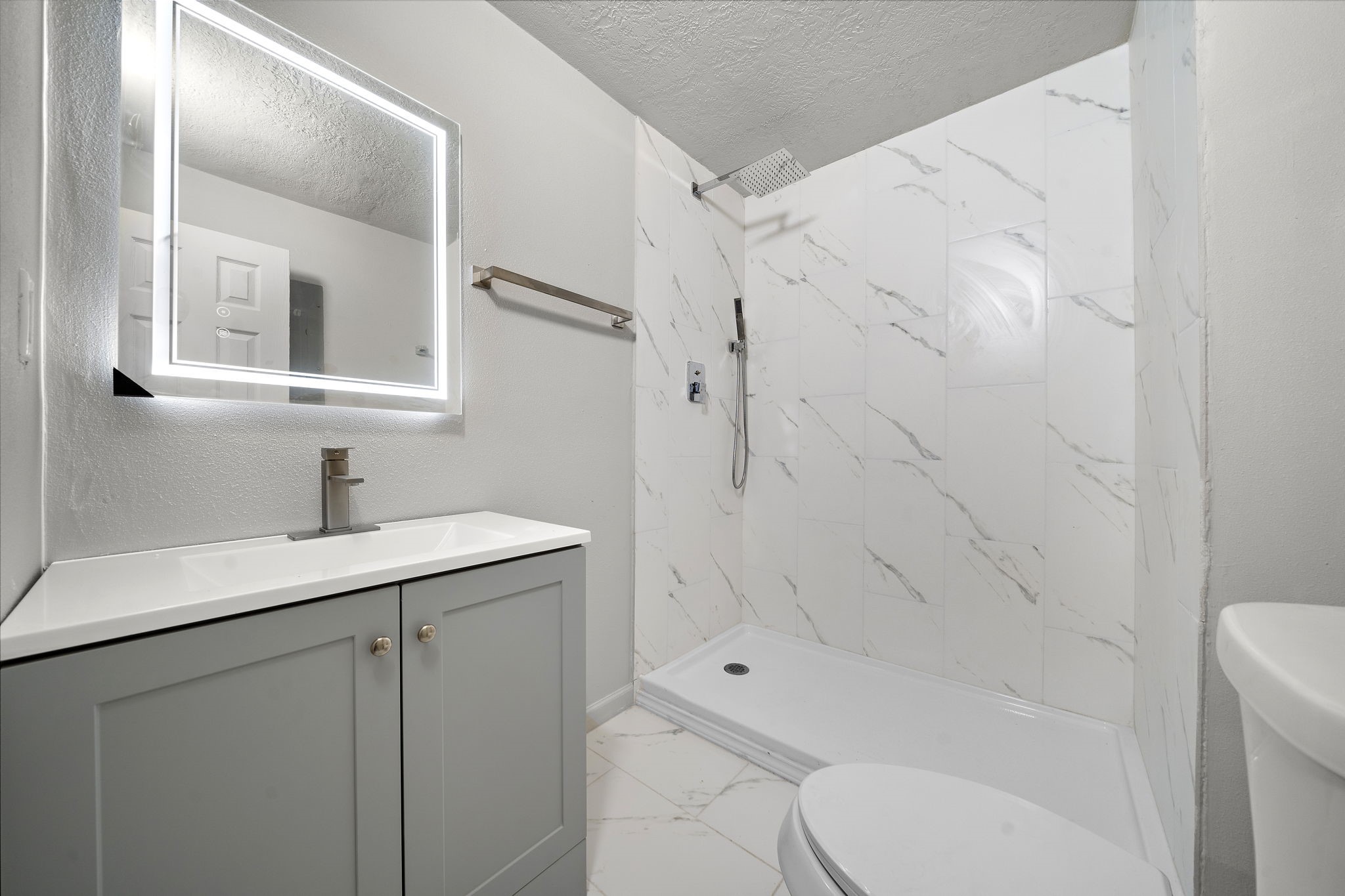 3121 Chimira Lane Houston, TX 77051 - Photo 24 of 35 a bathroom with a sink a toilet and shower