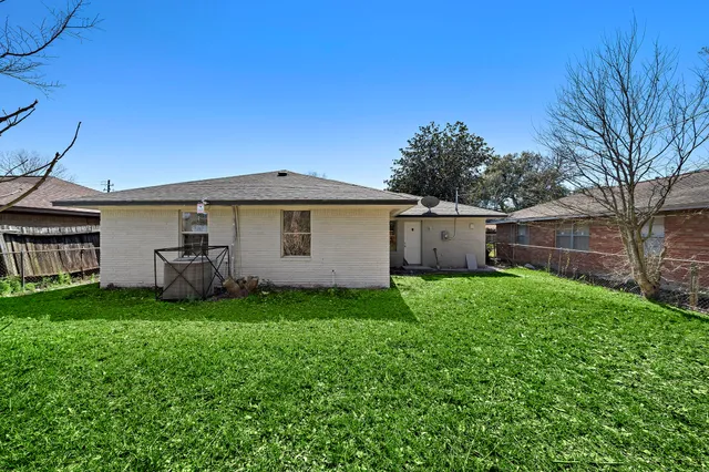 a view of a backyard with a garden