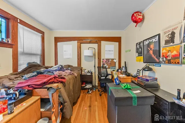 a living room with furniture and flat screen tv