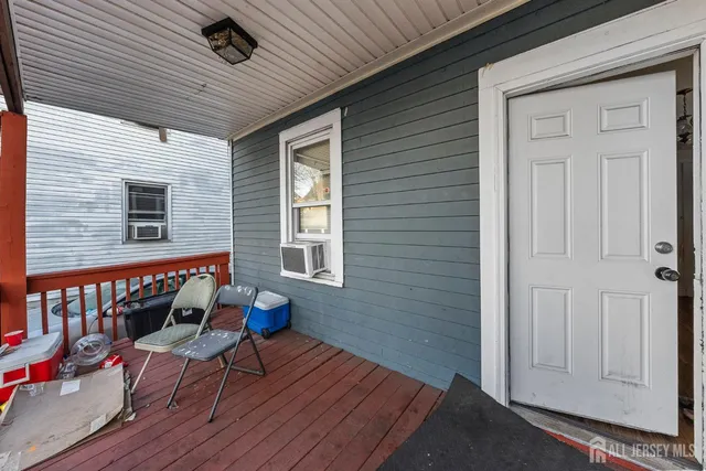 a view of a deck with wooden floor and outdoor space