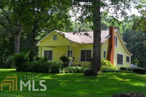 177 Stonepile Road Clarkesville, GA 30523 - Photo 1 of 1 a front view of a house with garden