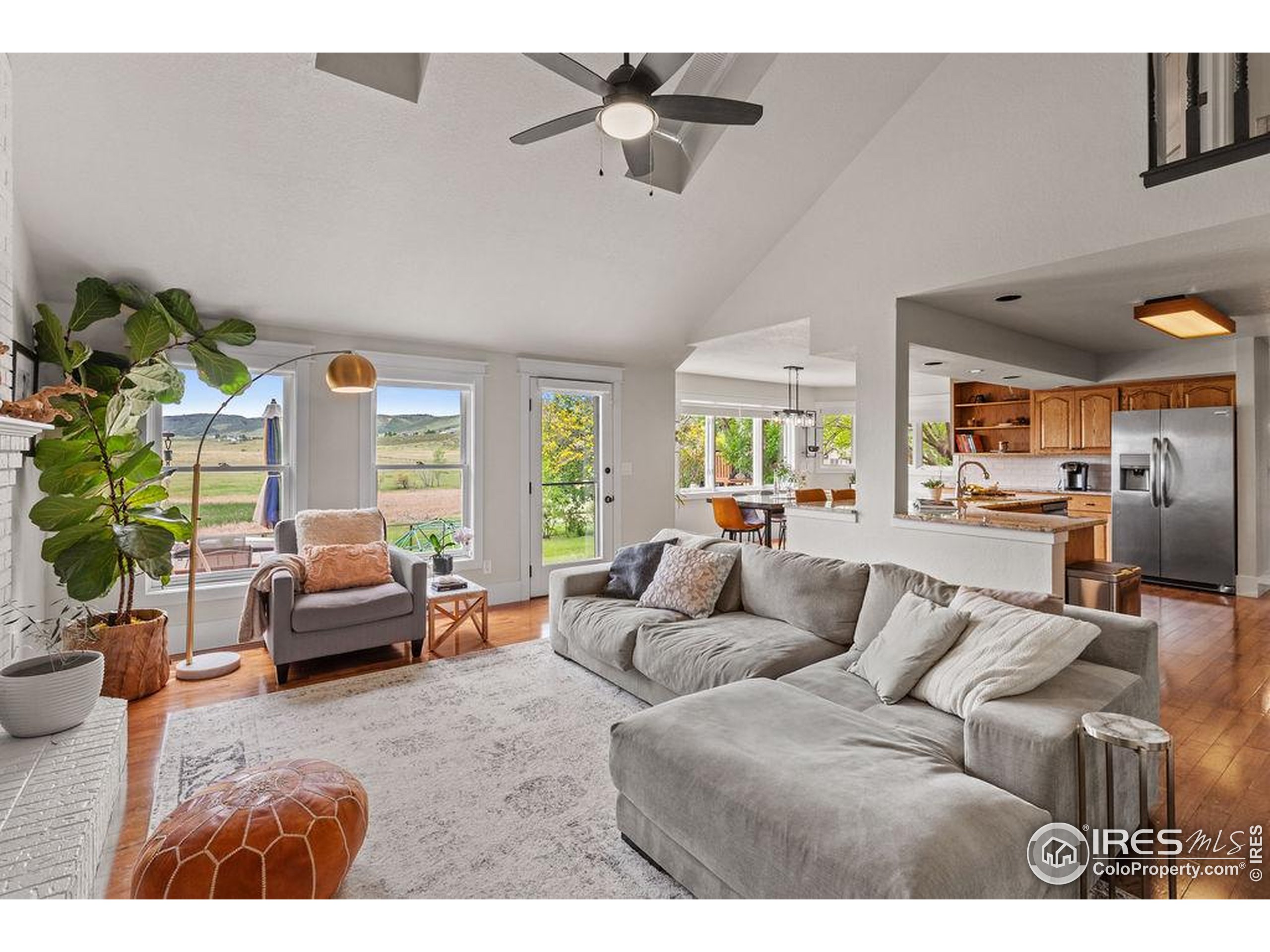 2213 Grosvenor Court Fort Collins, CO 80526 - Photo 14 of 40 a living room with furniture and a large window